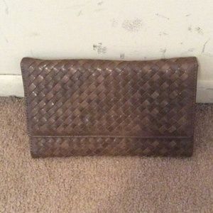 Brown clutch with gold chain gold never used