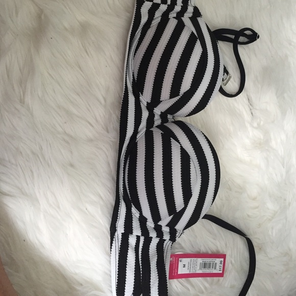Never worn. NWT. Too big for me