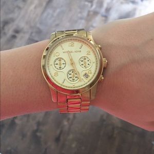 Womens Michael Kors gold watch