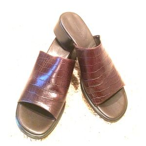 Brown, textured mules Etienne Aigner