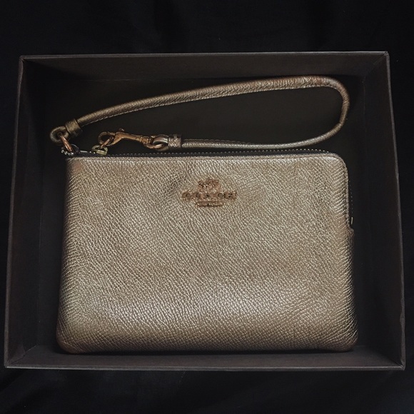 100% authentic Coach wristlet