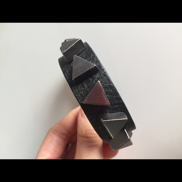 Bracelet / black leather with gunmetal nail head.