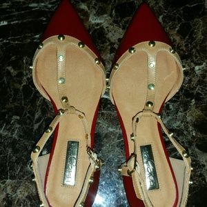 New red studded flats