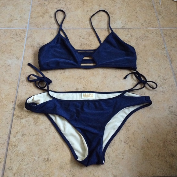 Two piece strap suit