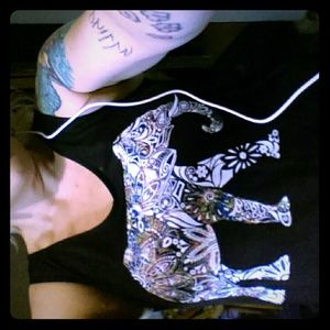 A tank top with a elephant on the front