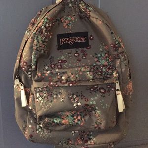 Gray and floral Jansport backpack