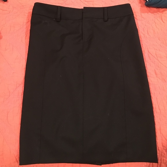 Knee length black skirt