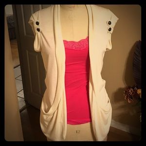 Cream short-sleeve shrug.