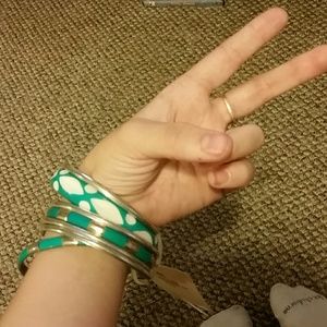 Green and silver bracelets