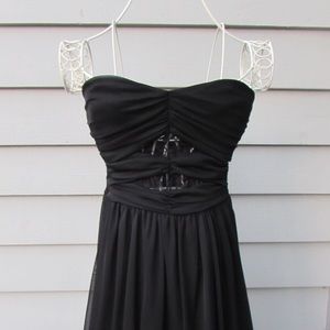 Black High-Low formal dress with lace cutouts