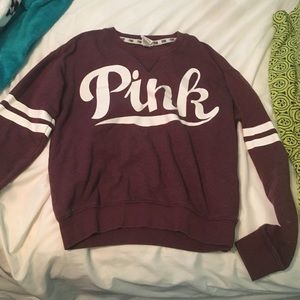 A pink sweater