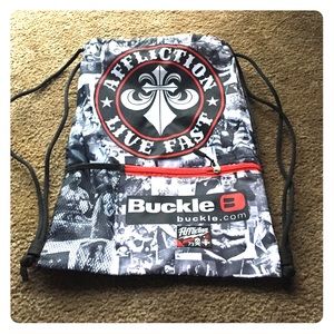 Affliction/buckle light back pack