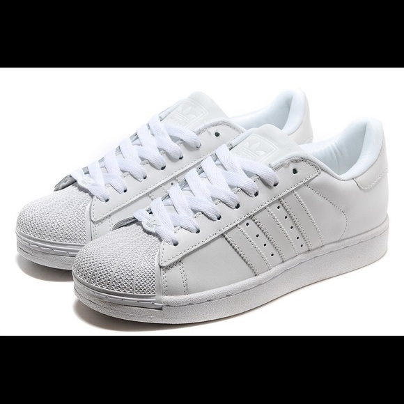 All white superstar Adidas shoes
