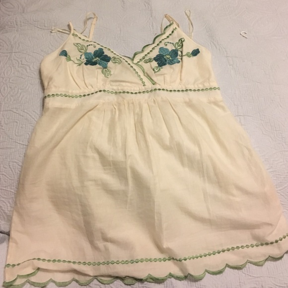 Green and ivory shirt.