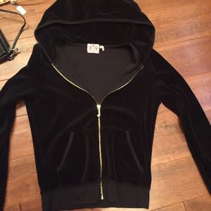 A Juicy Couture black velour zip-up