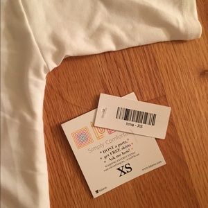 LuLaRoe Tops - NWT XS White LulaRoe Irma Tunic LuLaRoe Tops - NWT XS White LulaRoe Irma Tunic