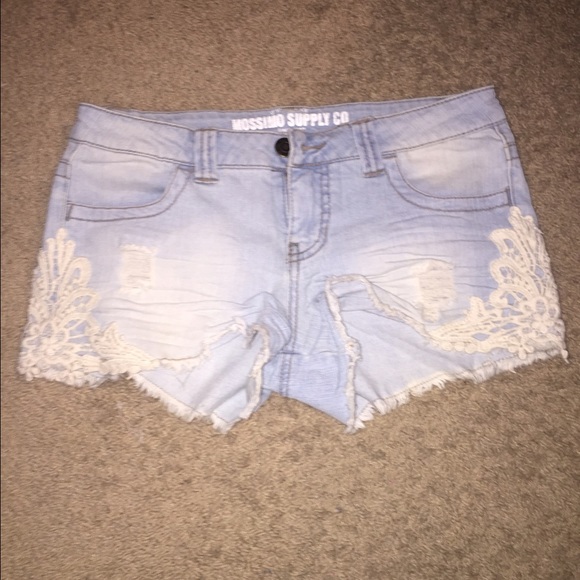 Light blue jean shorts with classy lace accents