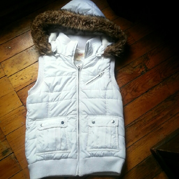 White vest with fur lined hood