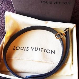 Louis Vuitton wallet leather brown strap.