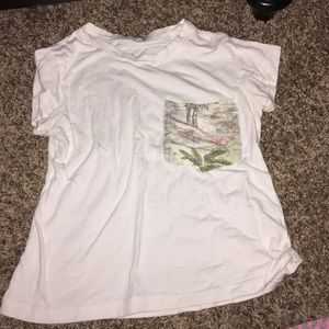 White top with accent pocket
