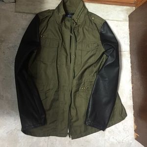 Army and leather jacket.