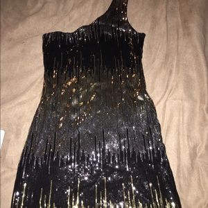 Sequined One shoulder black/ gold and silver.