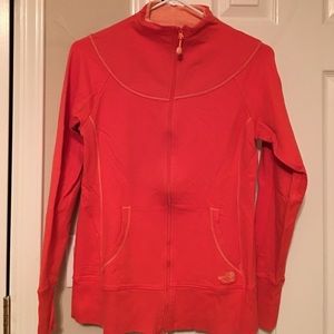 Orange north face workout sweater