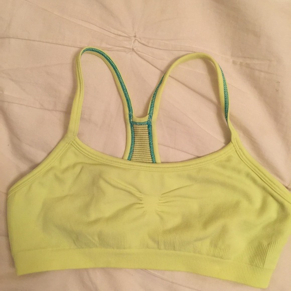 Bright yellow/lime green Ivivva sports bra.