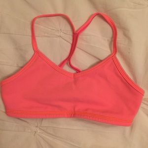 Neon pink Ivivva sports bra.