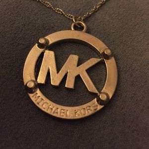 Mk necklace gold color
