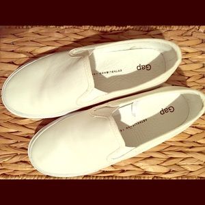White leather slip on shoes