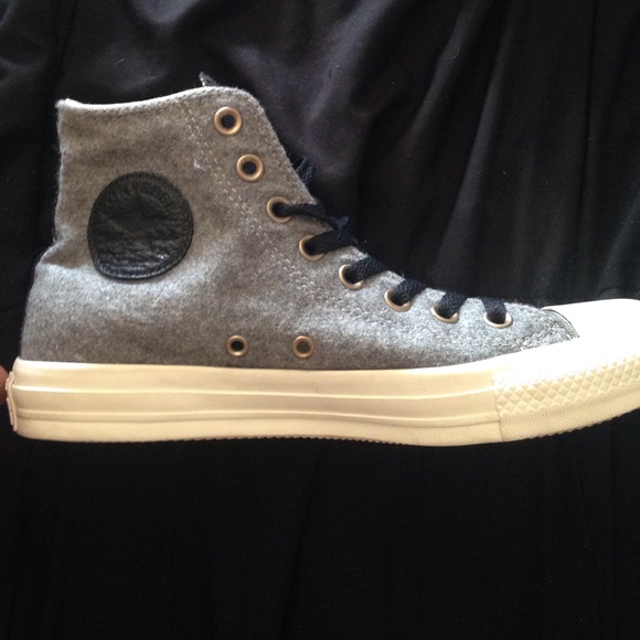 Gray converse high top with black leather details