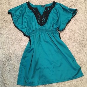 Beautiful real dress with black detail with stones