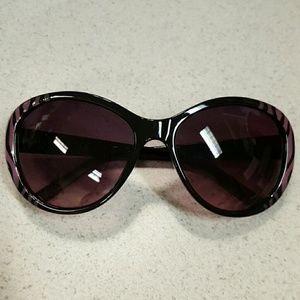 Purple zebra print sunglasses.