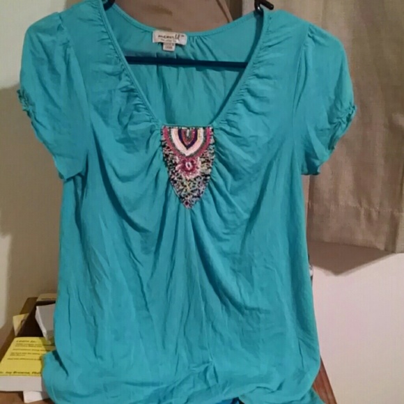 Medium one world torquiose loose fitting shirt!
