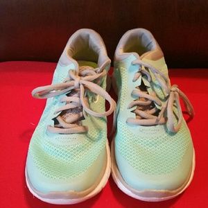 Teal colored sneakers