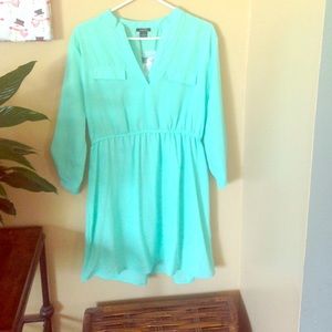 Turquoise chiffon dress.