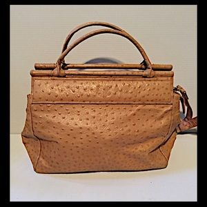 Beautiful leather bag. Logo is unknown