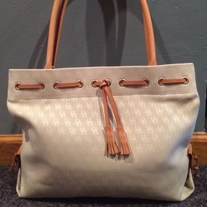 Dooney&Bourke cream bag with tossles