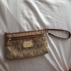 Authentic MK purse/wristlet. Lightly used!
