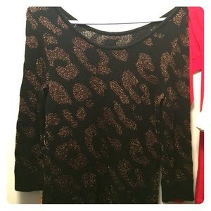 gorgeous black dress with gold accents