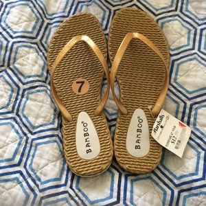 Gold flip flops