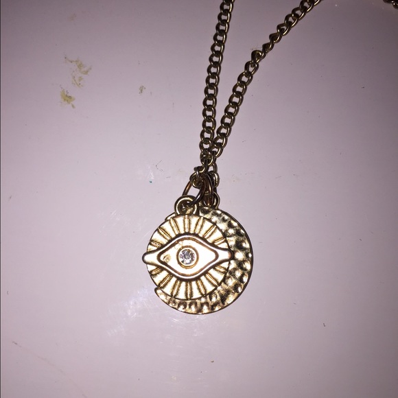 Gold sun moon and third eye necklace