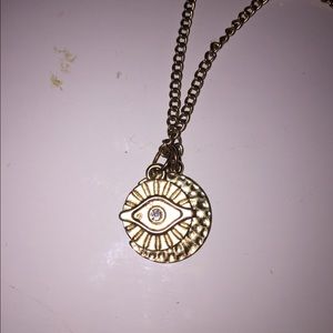 Gold sun moon and third eye necklace