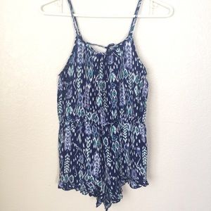 Super cute open back romper ✨