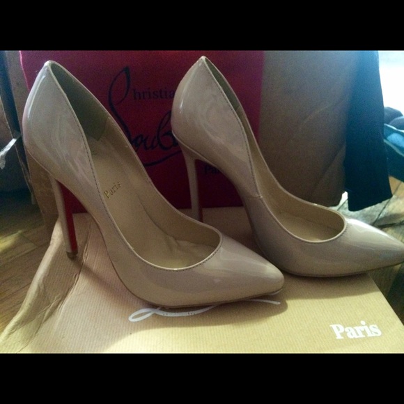 Nude Red bottom "so kate" style stiletto heels.