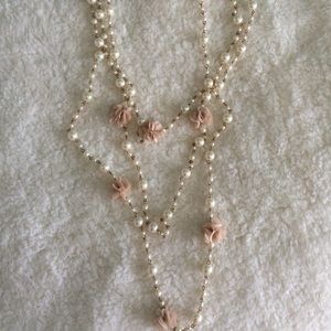 Long pearl and flower necklace