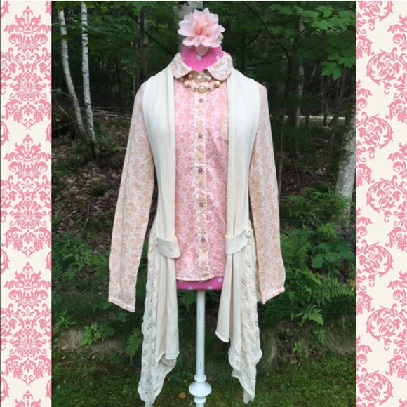 Off white sweater. Practically new.