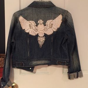 Cropped jean jacket. Runs small.