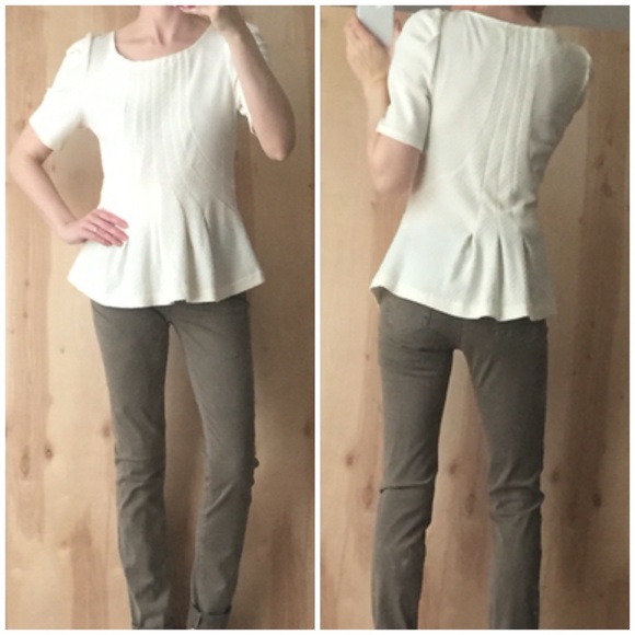 Anthropologie Tops - Anthropologie Ivory Textured Peplum Top